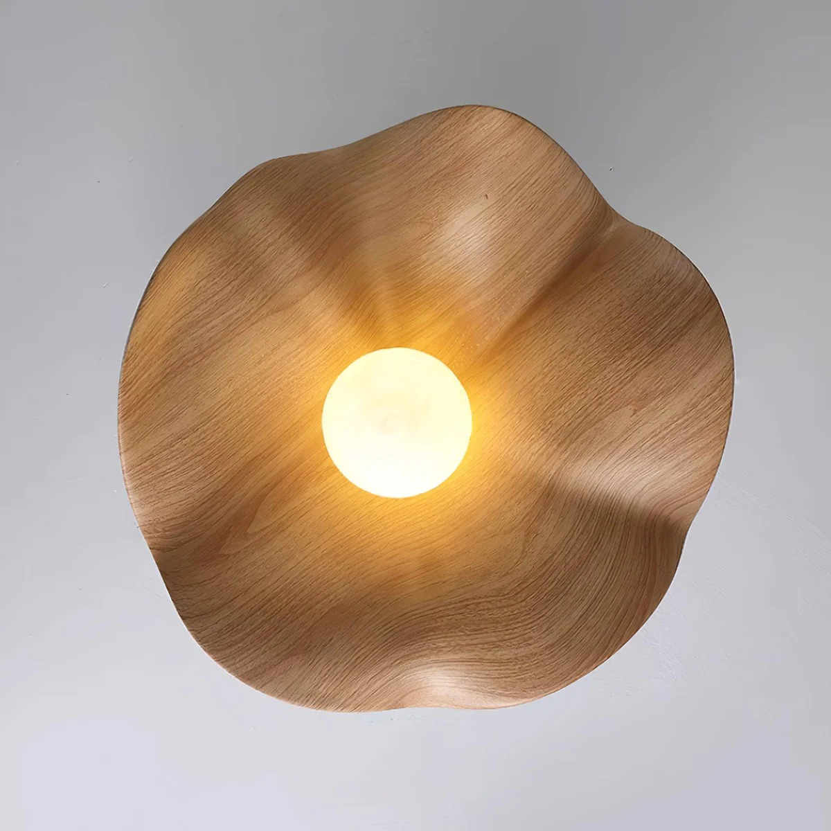 Carins Ceiling Light: Wood Grain Detail and Warm Illumination