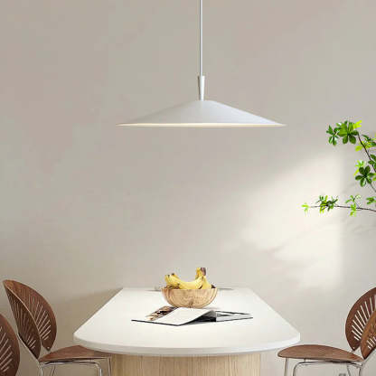Modern pendant light in dining room with fruit and table