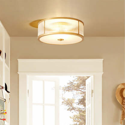 Alessio gold flush mount ceiling light with glass shade