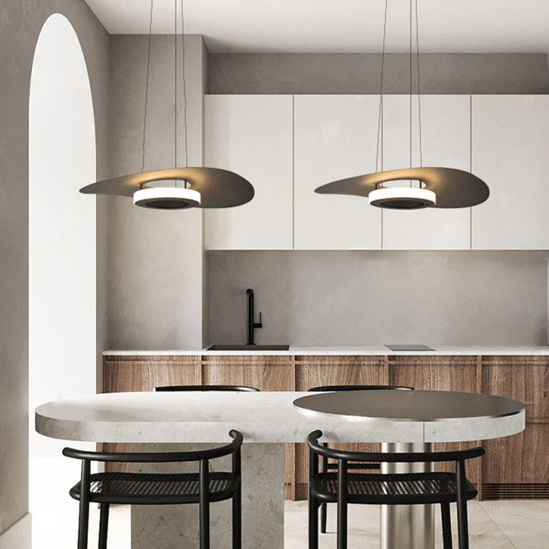 Modern pendant lights above dining table