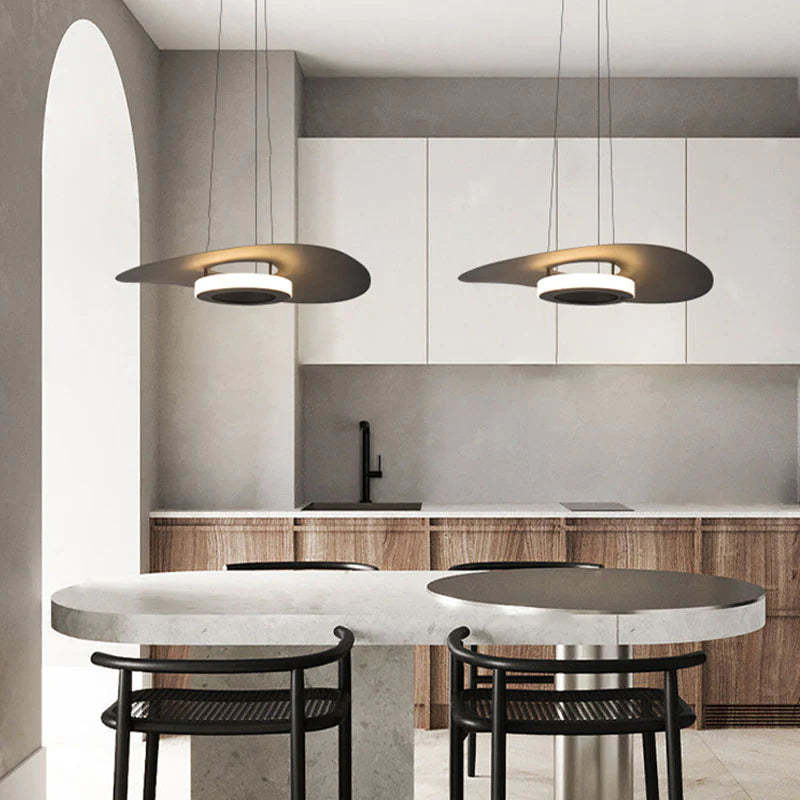 Modern pendant lights above dining table