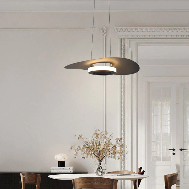 Modern Carins pendant light over a dining area