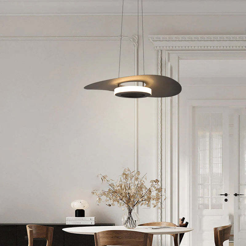 Modern Carins pendant light over a dining area