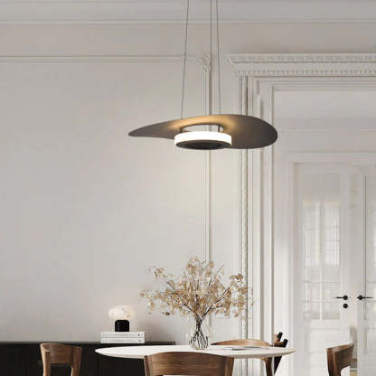 Modern Carins pendant light over a dining area