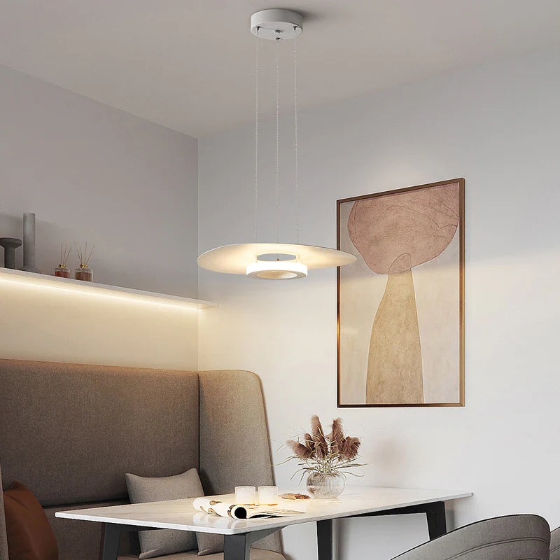 Modern Carins Pendant Light illuminating dining area