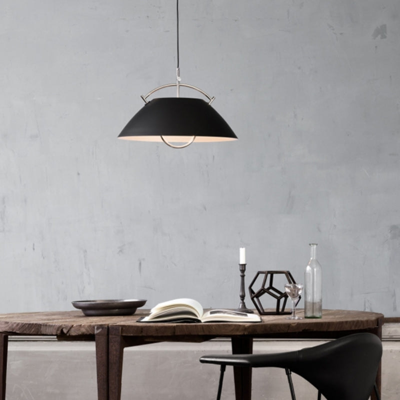 Black Cairns Nordic Pendant Light over dining table setting