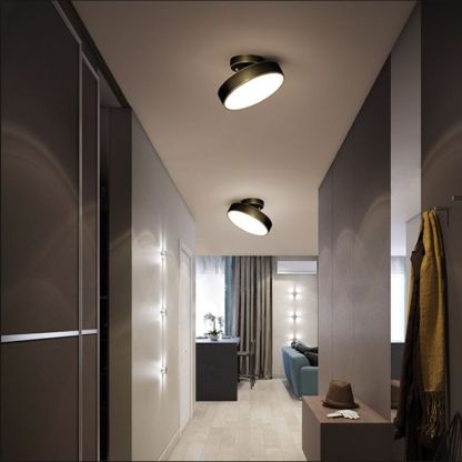 Hallway illuminated by Bella flush mount ceiling lights.
