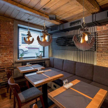 Retro anchor pendant light fixture in restaurant interior