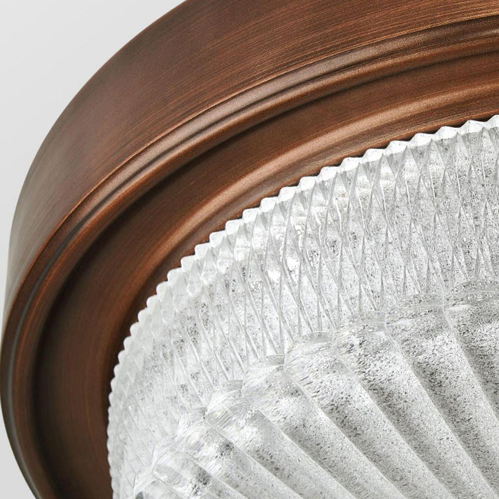 Close-up of Alessio vintage flush mount light glass detail.