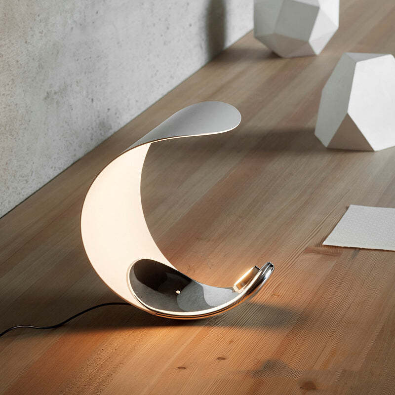 Elif Design Moon Arc Lamp on wood floor.