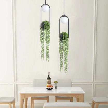 Las Sola metal plant pot pendant light over dining table