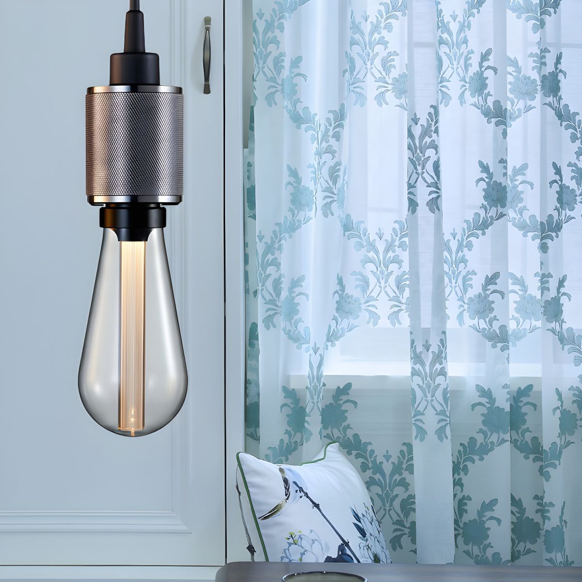 Cooley Modern Industrial Pendant Light illuminating a room