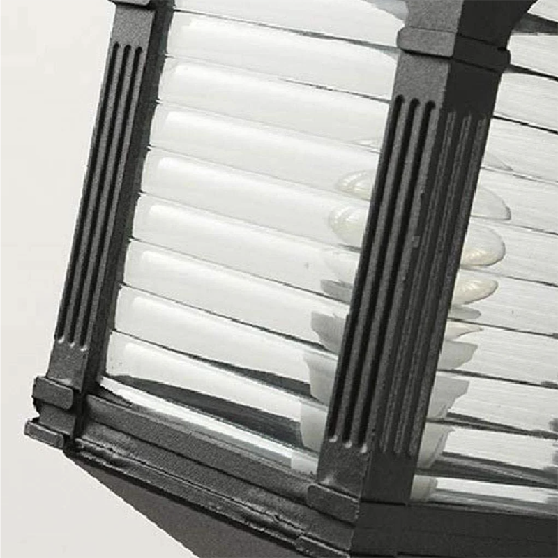 Close up of Brady Vintage Outdoor Wall Lamp's Glass and Metal