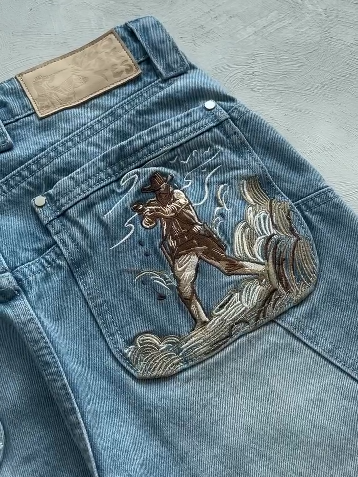 WILD WEST EMBROIDERED JEANS 