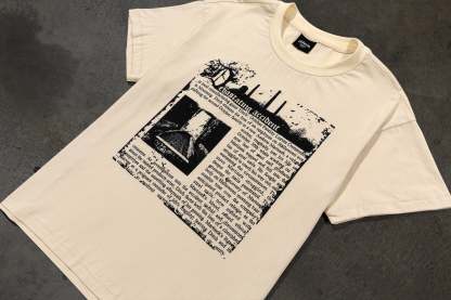 DEVASTATING NEWS TEE (CREME)-IYAMIUIO