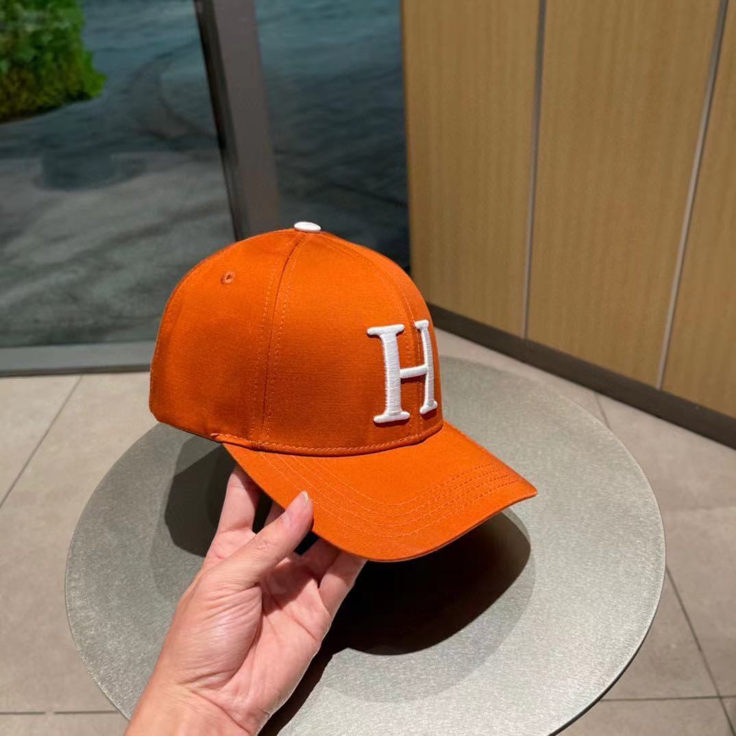 HM NEW CARRIAGE BASEBALL CAP ORANGE