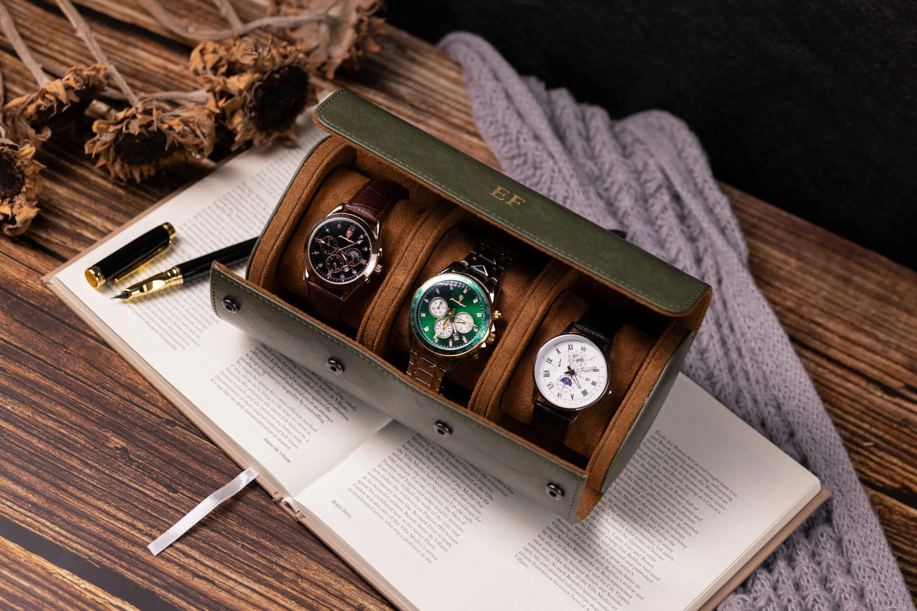 Green watch roll case holding multiple watches for organized storage