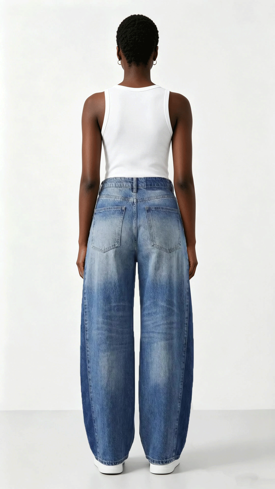 model wearing wide leg contrast jeans streetwear outfit