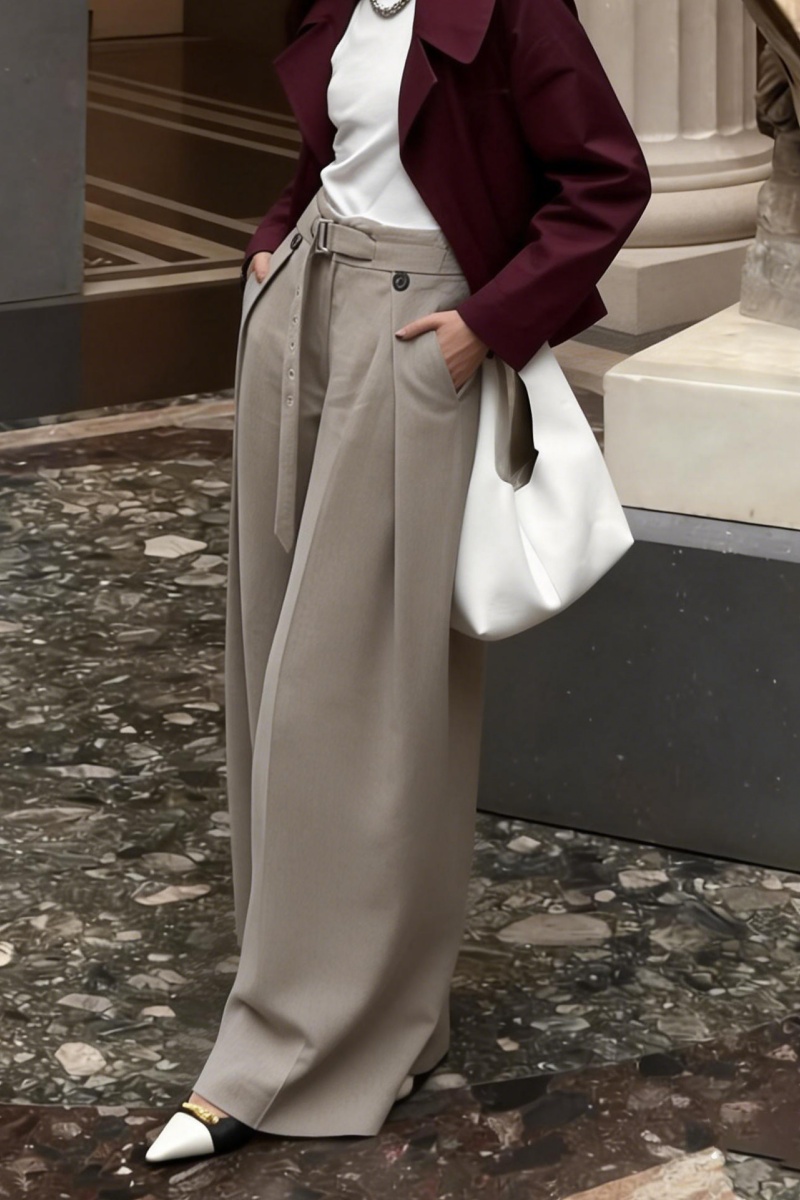 Loose-fitting straight-leg trousers with a three-dimensional pleated, draped waistband.