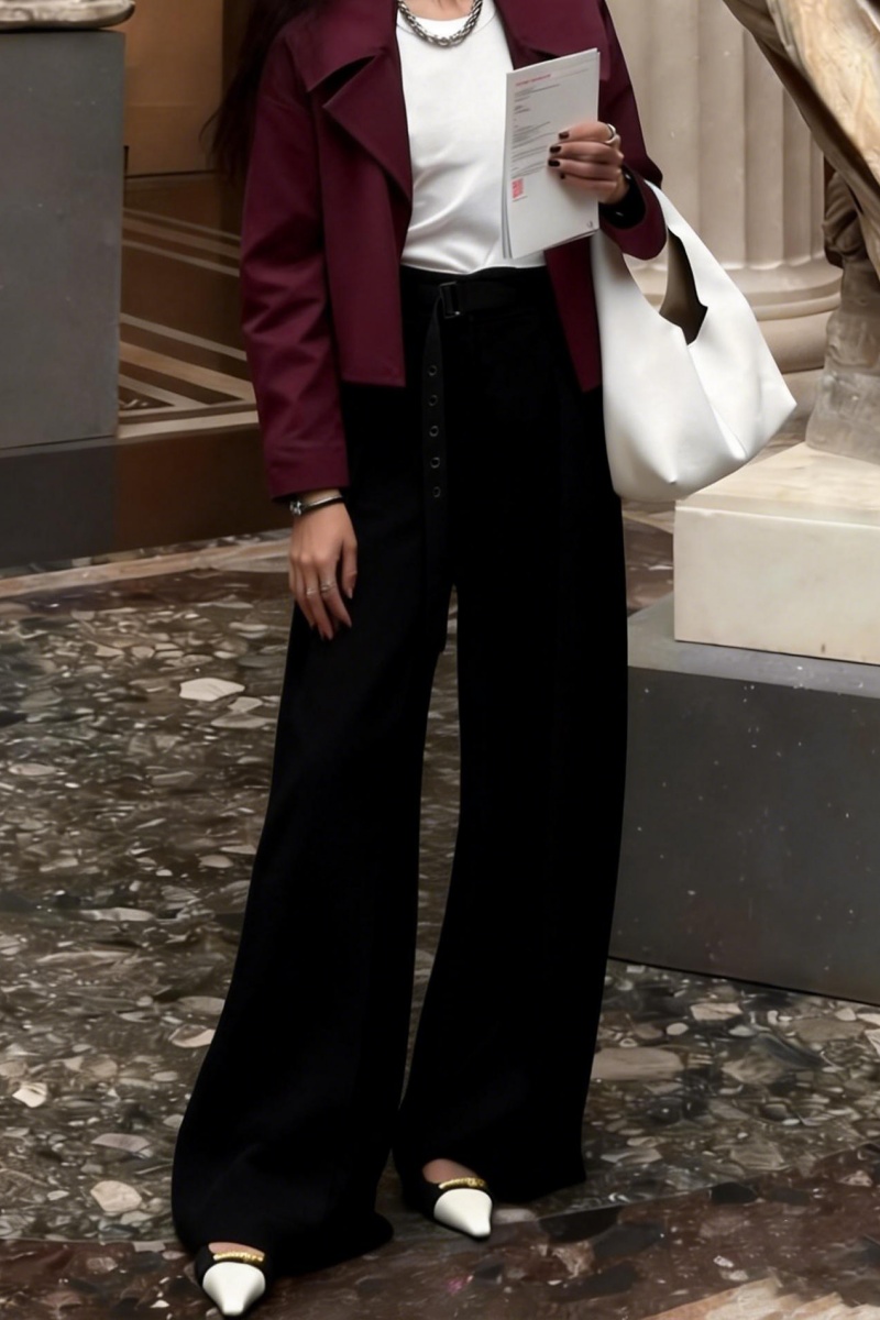 Loose-fitting straight-leg trousers with a three-dimensional pleated, draped waistband.