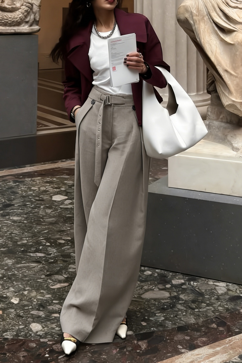 Loose-fitting straight-leg trousers with a three-dimensional pleated, draped waistband.
