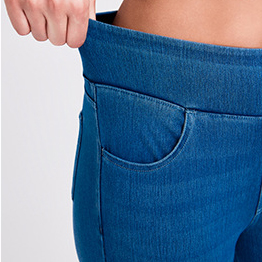 Whisker wash retro style denim jeans - close-up of high elastic waistband with tummy control feature