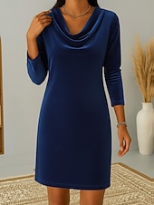 This women's velvet dress with a cowl neck exudes elegance and sophistication.