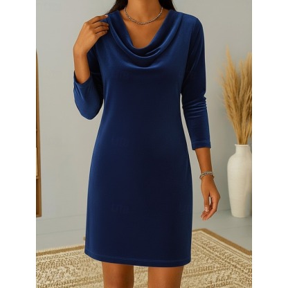 This women's velvet dress with a cowl neck exudes elegance and sophistication.