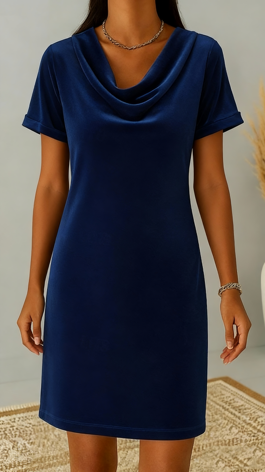 This women's velvet dress with a cowl neck exudes elegance and sophistication.