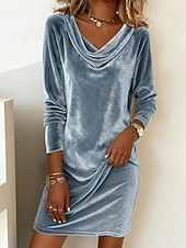 This women's velvet dress with a cowl neck exudes elegance and sophistication.