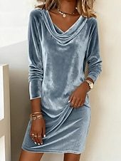 This women's velvet dress with a cowl neck exudes elegance and sophistication.
