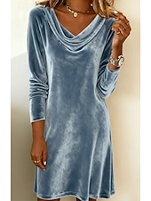 This women's velvet dress with a cowl neck exudes elegance and sophistication.