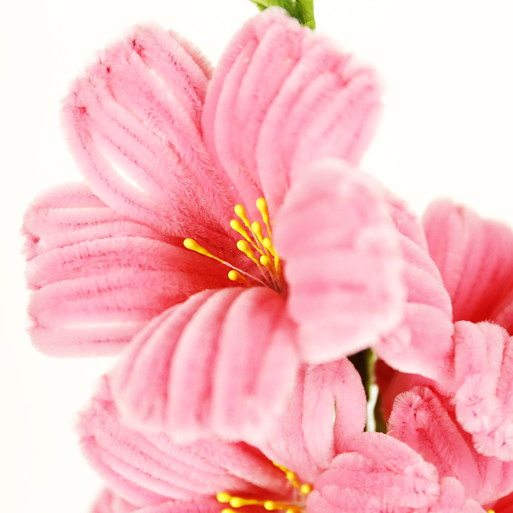 OE08003MT	 L27.5"W7"H4.5"EASTER FLOWER PICK