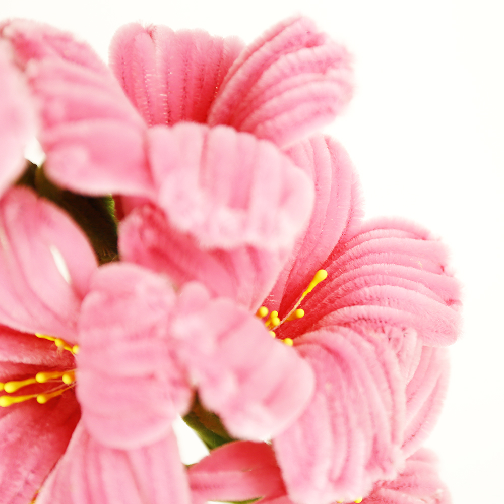 OE08003MT	 L27.5"W7"H4.5"EASTER FLOWER PICK