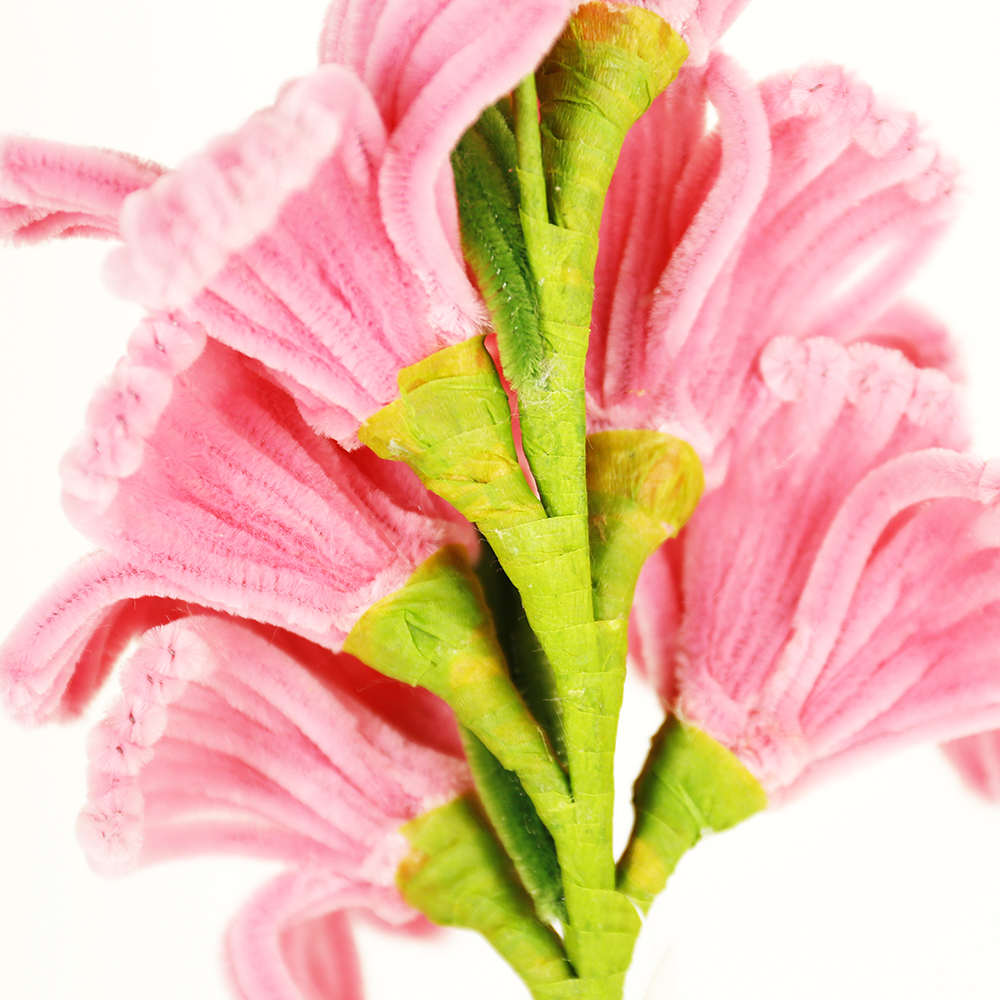 OE08003MT	 L27.5"W7"H4.5"EASTER FLOWER PICK