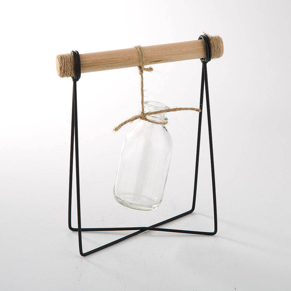 86076	 L6.5"W3"H8.5" - GLASS BOTTLE WITH A SWING BASE