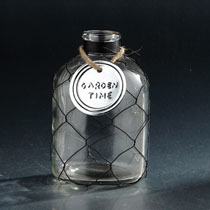 D4.5"H6.5" - GLASS BOTTLE WITH WIRE MESH