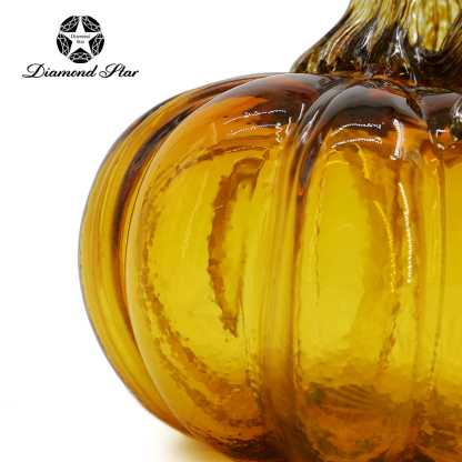 79510	 L5.3"W5.3"H4.1" - GLASS PUMPKIN WITH CURLY STEM