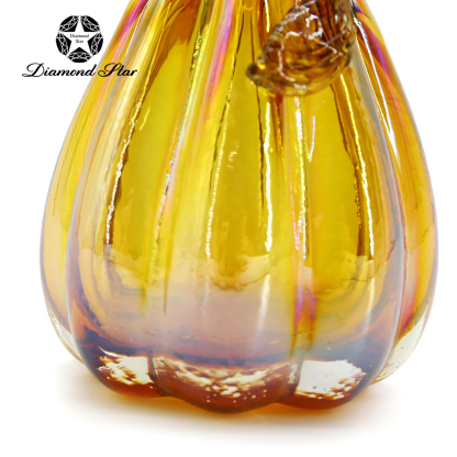 79511	 L4.1"W4.1"H8.3" - GLASS PUMPKIN WITH CURLY STEM