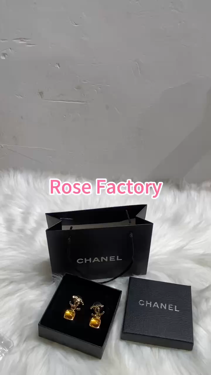 Chanel yellow earrings