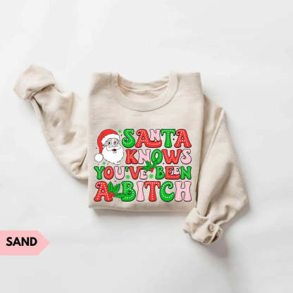 Santa Knows You’ve Been A B*tch – Humorous Christmas Graphic Shirt