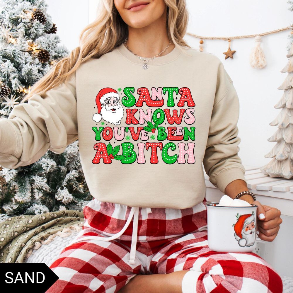 Santa Knows You’ve Been A B*tch – Humorous Christmas Graphic Shirt