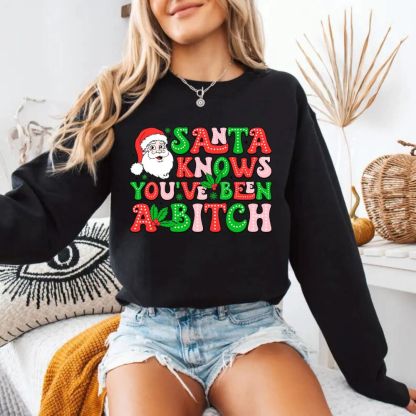 Santa Knows You’ve Been A B*tch – Humorous Christmas Graphic Shirt