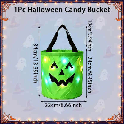 A green inflatable Halloween candy bucket with black handles and a jack-o'-lantern face, shown with overlaid dimensions (34 cm tall, 22 cm wide) and a lighted glow effect. The image includes the text '1Pc Halloween Candy Bucket' and a decorative Halloween border with ghosts and spiderwebs.