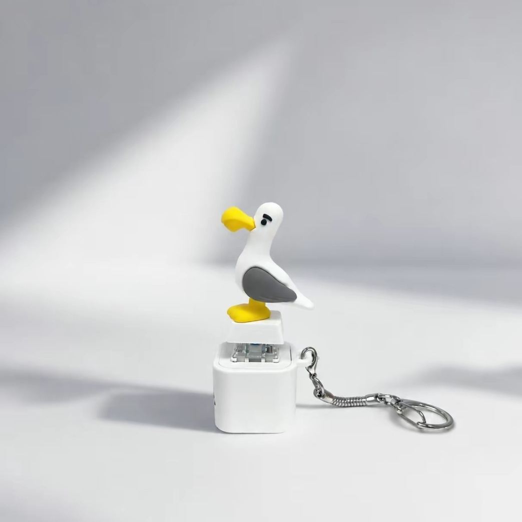 Light Up Animal Keychain Toy - Rechargeable LED Color Changing Sound Button