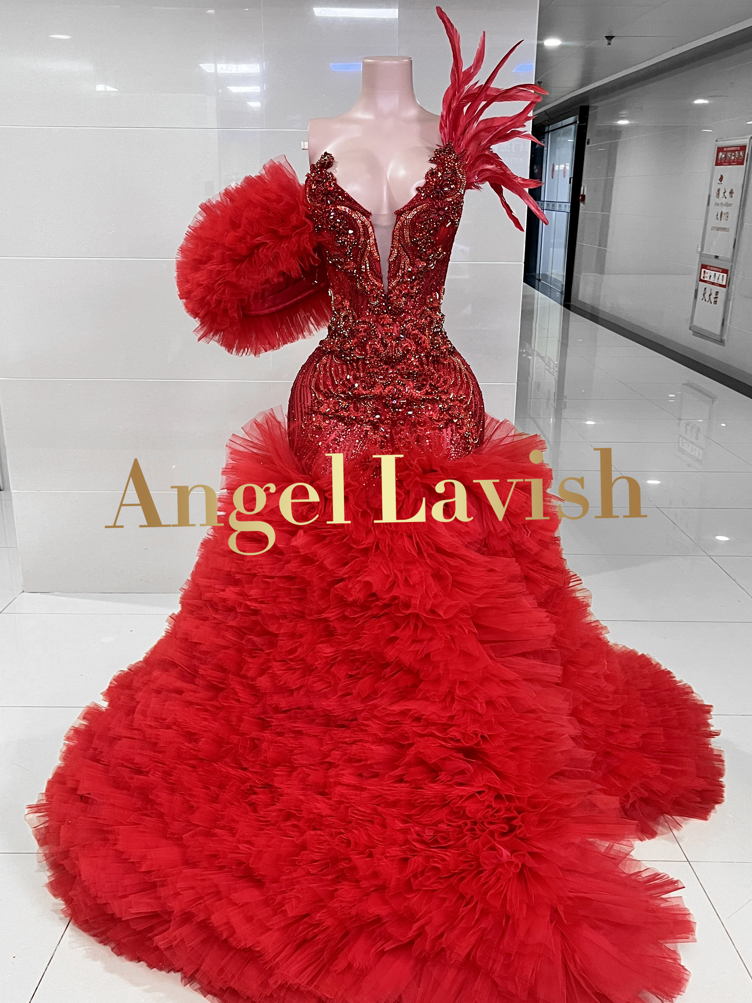 Radiant Red Feather Ball Gown