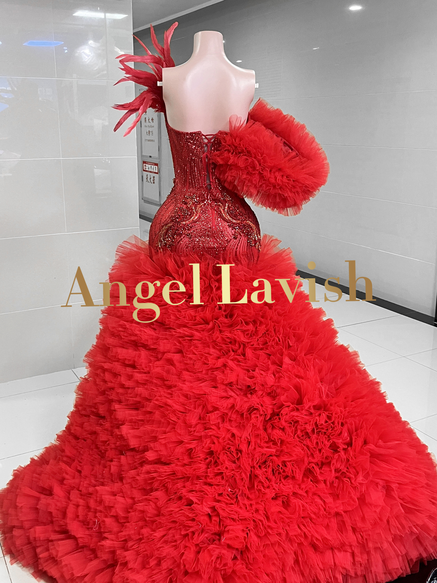 Radiant Red Feather Ball Gown