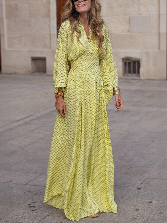 Flowy Printed Maxi Dress with Smocked Waist and Flared Sleeves