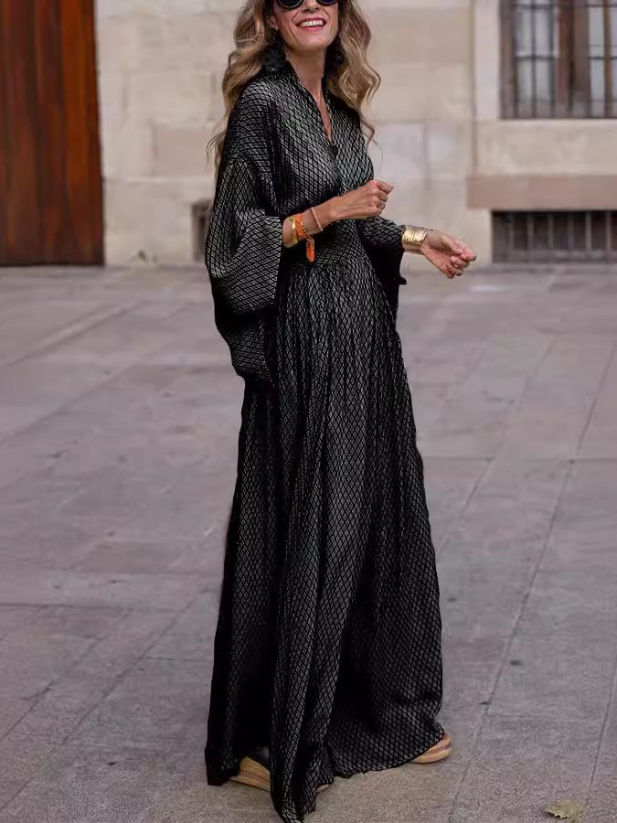 Flowy Printed Maxi Dress with Smocked Waist and Flared Sleeves