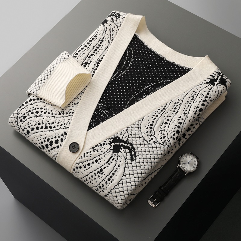 "Men's wool sweater with a 3D pumpkin knit pattern."